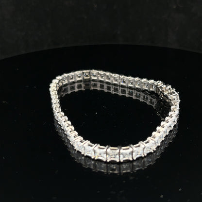 Silver tennis bracelet weighing 15.6g with a sleek, elegant design, featuring closely linked chain links for a sophisticated look.