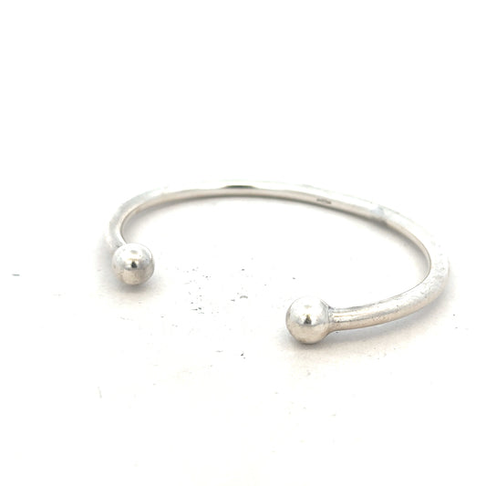 Silver torque bangle bracelet, 20g, with a sleek, polished design, perfect for stylish daily wear.
