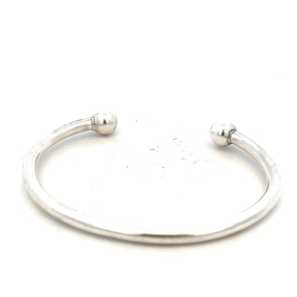 Silver torque bracelet with a 20g weight, unbranded men's jewelry bangle showcasing a sleek, minimalist design.