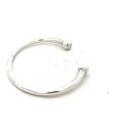 Silver torque bangle bracelet with 20g weight, unbranded, featuring a sleek, polished silver design for stylish wear.