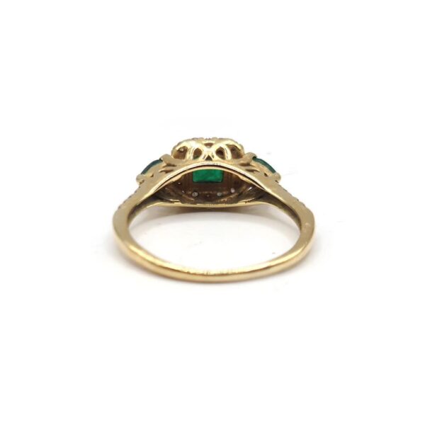 https://shared1.ad-lister.co.uk/UserImages/f9858451-6400-46df-9300-45516e64c4e1/Img/Diamondrings/18ct-yellow--gold-080-carat-emeralds--14-carat-diamond-ring-size-O-p2.jpg