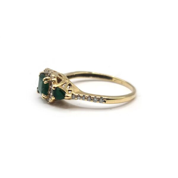 https://shared1.ad-lister.co.uk/UserImages/f9858451-6400-46df-9300-45516e64c4e1/Img/Diamondrings/18ct-yellow--gold-080-carat-emeralds--14-carat-diamond-ring-size-O-p4.jpg